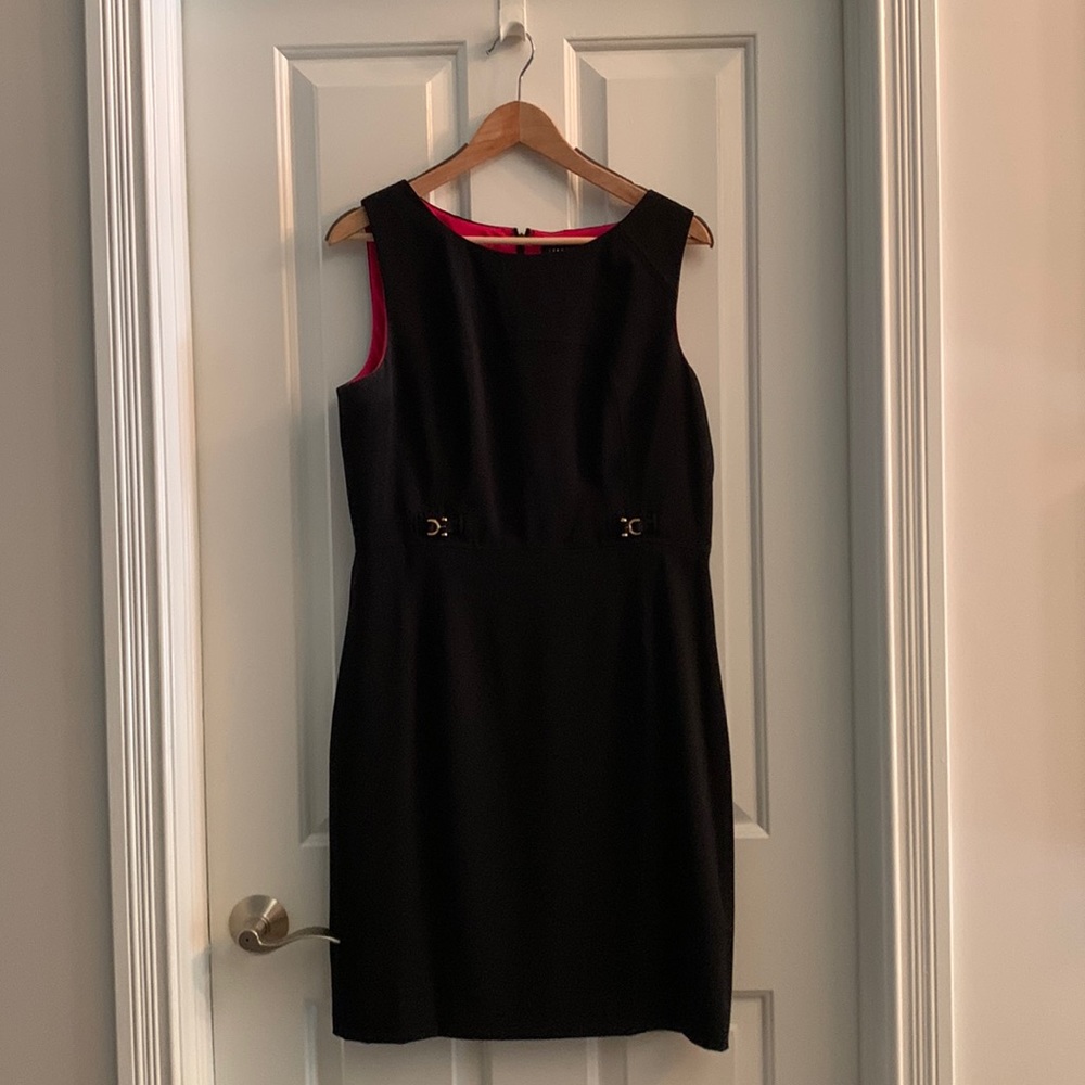 Ivanka Trump black sleeveless midi,red inner lining with gold accents. No stains